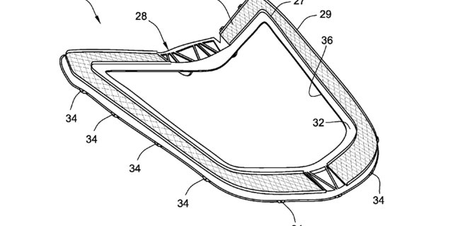 A patent drawing suggests the car will feature an engine cover with a glass window supported by a mesh vent surround.