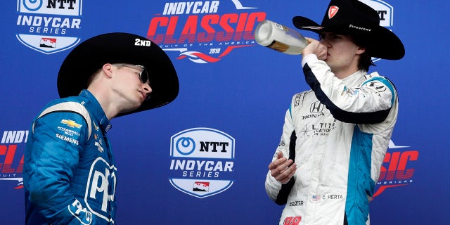 Runner-up Josef Newgarden checked the label on Herta's bottle when he saw him take a drink.