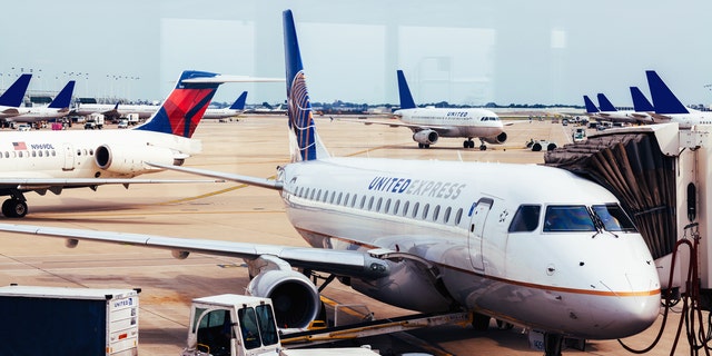 A pilot on a Mesa Airlines flight operated by United Express did his best to put wind back in his passengers’ sails after a delay of more than two hours.