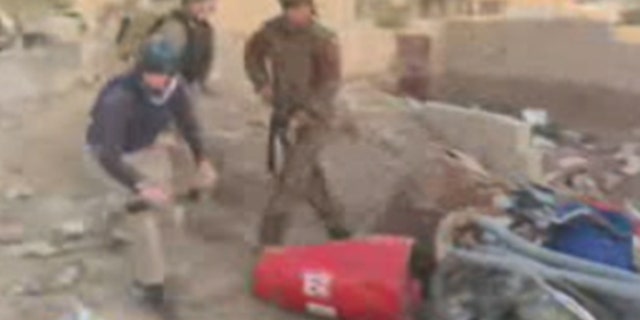 A Fox News team in Syria can see terrorists scavenging, milling around closely. Sometimes they shout. They’re moving around, driving motorbikes, digging for roots, and carrying AK47s and RPGs.