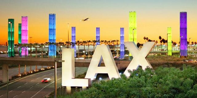 Lightning on Tuesday night caused a power outage at Los Angeles International Airport and forced a plane to return to the airport after being struck by lightning, officials said.