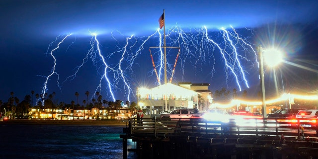 This time exposure photo provided by the Santa Barbara County Fire Department shows a series of lightning strikes over Santa Barbara, Calif., seen from Stearns Wharf in the city's harbor, Tuesday evening, March 5, 2019.