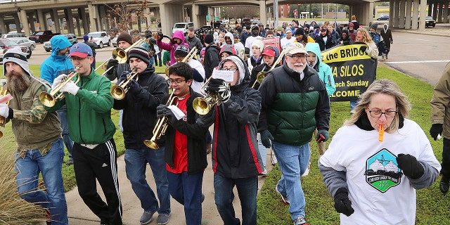Church Under the Bridge pastor Jimmy Dorrell and his wife Janet, right, lead around 300 members from their home for 26 years to a temporary location at the Magnolia Market at the Silos, Sunday, March 3, 2019, in Waco, Texas.