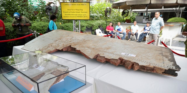 Debris from the missing Malaysia Airlines Flight MH370 is displayed during a Day of Remembrance for MH370 event in Kuala Lumpur, Malaysia, Sunday, March 3, 2019.