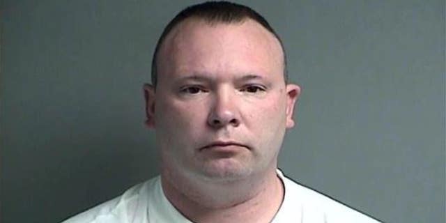 George Gunderman is accused of stealing his police department's cable TV box and seeking pay for time he didn't work.
