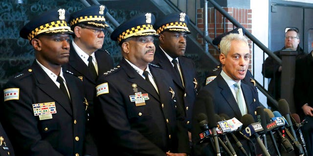Chicago Mayor Rahm Emanuel, right, and Chicago Police Superintendent Eddie Johnson, center, appear at a news conference Tuesday, March 26, 2019, after prosecutors abruptly dropped all charges against "Empire" actor Jussie Smollett. (AP Photo/Teresa Crawford)