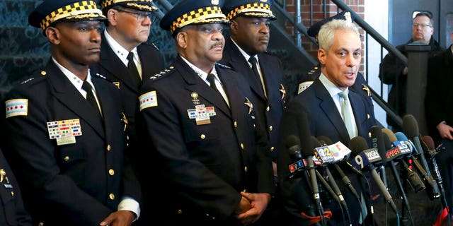 Chicago Mayor Rahm Emanuel, right, and Chicago Police Superintendent Eddie Johnson, center, appear at a news conference Tuesday, March 26, 2019, after prosecutors abruptly dropped all charges against "Empire" actor Jussie Smollett. (AP Photo/Teresa Crawford)