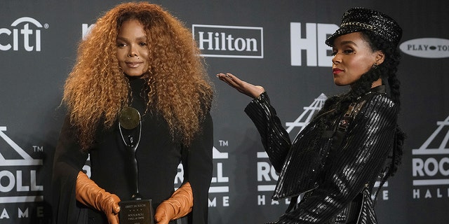 Inductee Janet Jackson, left, holds her trophy as she poses in the press room with Janelle Monae at the Rock &amp; Roll Hall of Fame induction ceremony at the Barclays Center on Friday, March 29, 2019, in New York.