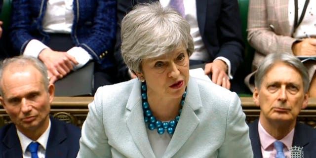 Britain's Prime Minister Theresa May makes a statement on Brexit to lawmakers in the House of Commons, London, Monday March 25, 2019. May is under intense pressure Monday to win support for her Brexit deal to split from Europe.