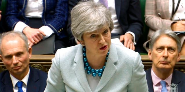 Britain's Prime Minister Theresa May makes a statement on Brexit to lawmakers in the House of Commons, London, Monday March 25, 2019. May is under intense pressure Monday to win support for her Brexit deal to split from Europe.