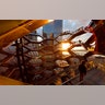 People stand on the Vessel at Hudson Yards a staircase sculpture designed by Thomas Heatherwick at sunset in New York City, March 18, 2019. 