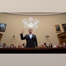 Michael Cohen, President Donald Trump's former personal lawyer, is sworn in to testify on Capitol Hill in Washington, Feb. 27, 2019. 