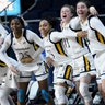 Quinnipiac players celebrate their win over Marist during their college basketball game in the Metro Atlantic Athletic Conference in Albany, March 11, 2019.