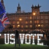 A sign reading "LET US VOTE" is set up outside Parliament by the public and civic organization Avaaz in London, March 27, 2019. 