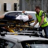 Ambulance staff takes a man from a mosque following a shooting in Christchurch, New Zealand, March 15, 2019. 