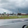 A funnel cloud can be seen in Byron, Ga., Sunday, March 3. The National Weather Service on Sunday issued a series of tornado warnings stretching from Phenix City, Ala., near the Georgia state line to Macon, Ga., about 100 miles to the east. 