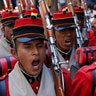 Bolivia's "Batallon Colorados," sing the national anthem during an event honoring national hero Eduardo Abaroa, who died in the 1879-1883 War of the Pacific, as part of Sea Day celebrations in La Paz, Bolivia, March 23, 2019. 