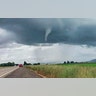 A funnel-shaped cloud forms on I-10 near Marianna, Fla., Sunday, March 3. Numerous tornado warnings were posted across parts of Alabama, Georgia, Florida and South Carolina on March 3 as the powerful storm system raced across the region.?