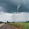 A funnel-shaped cloud forms on I-10 near Marianna, Fla., Sunday, March 3. Numerous tornado warnings were posted across parts of Alabama, Georgia, Florida and South Carolina on March 3 as the powerful storm system raced across the region. 