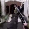 A still image taken from video circulated on social media, apparently taken by a gunman and posted online live as the attack unfolded, shows him entering a mosque in Christchurch,