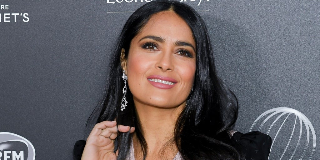 Salma Hayek gets a huge tattoo on her chest flaunts it like a queen as she  slips her bathrobe  view pic