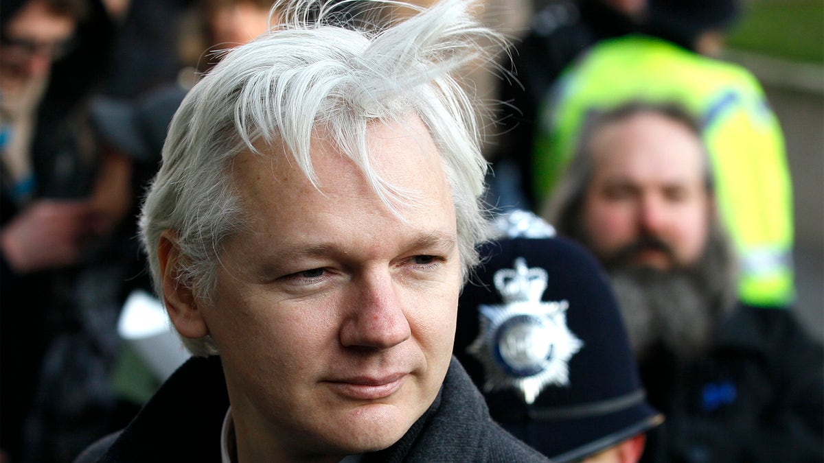 FILE - In this Feb. 1, 2012 file photo, Julian Assange, WikiLeaks founder, arrives at the Supreme Court in London. (AP Photo/Kirsty Wigglesworth, File)