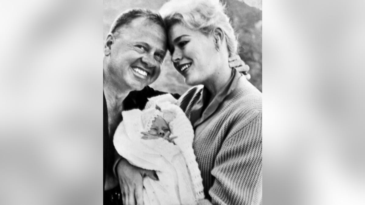 Mickey Rooney with his wife Barbara Thomason and their daughter Kelly.