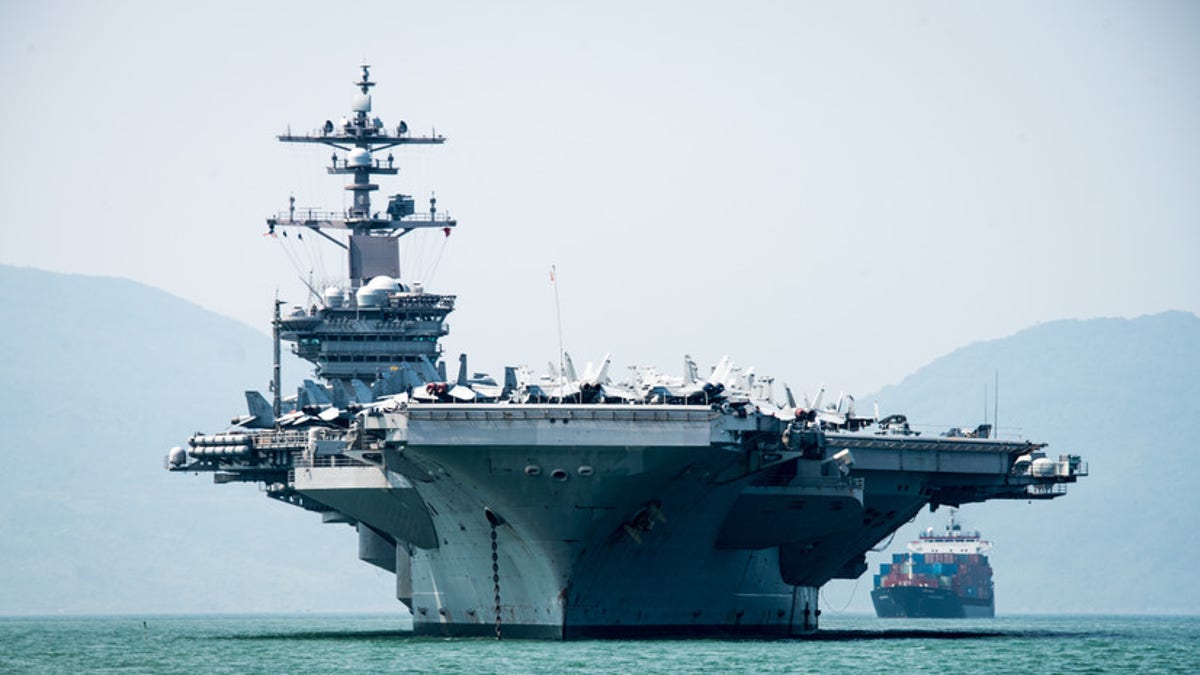 180305-N-BS159-0039 DA NANG, Vietnam (March 5, 2018) The Nimitz-class aircraft carrier USS Carl Vinson (CVN 70) arrives in Da Nang, Vietnam for a scheduled port visit. The Carl Vinson Strike Group is in the Western Pacific as part of a regularly scheduled deployment. (U.S. Navy photo by Mass Communication Specialist 3rd Class Devin M. Monroe/Released)