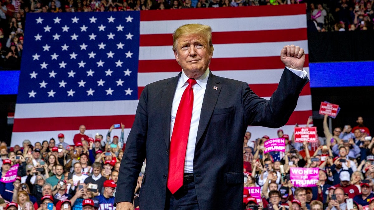 President Donald Trump gestures at a campaign rally at Van Andel Arena in Grand Rapids, Mich., on Thursday, March 28, 2019. (Associated Press)