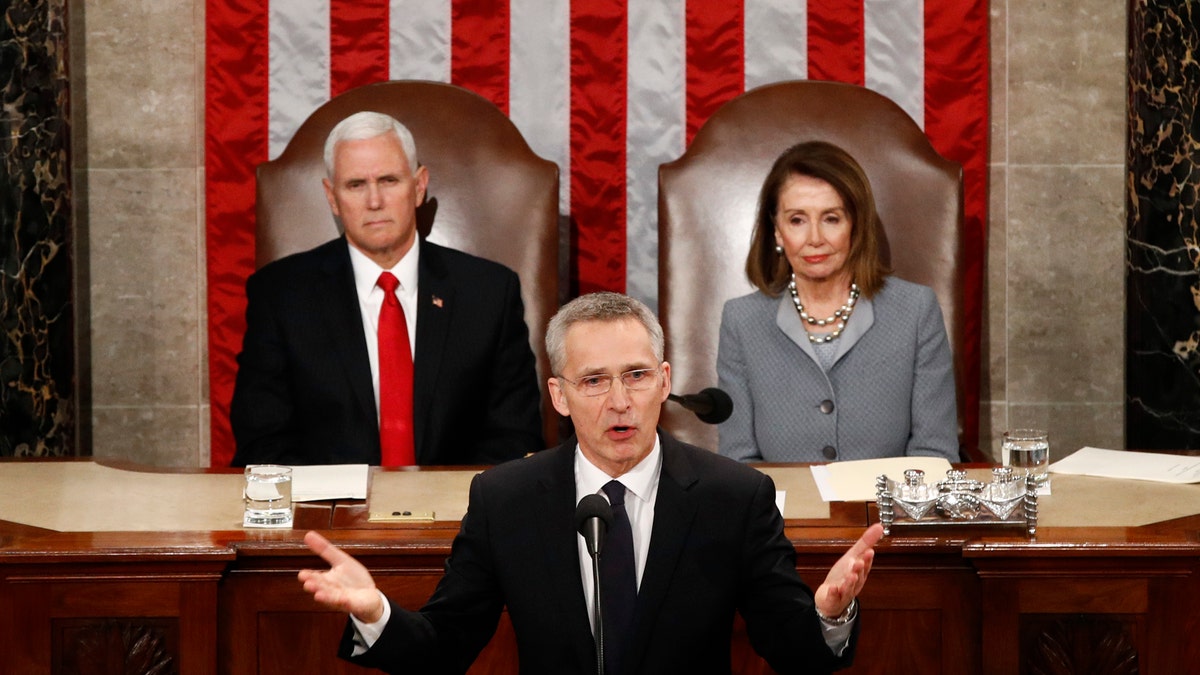 NATO Secretary General Jens Stoltenberg, accompanied by then-Vice President Mike Pence and House Speaker Nancy Pelosi addresses a Joint Meeting of Congress (AP Photo/Patrick Semansky)