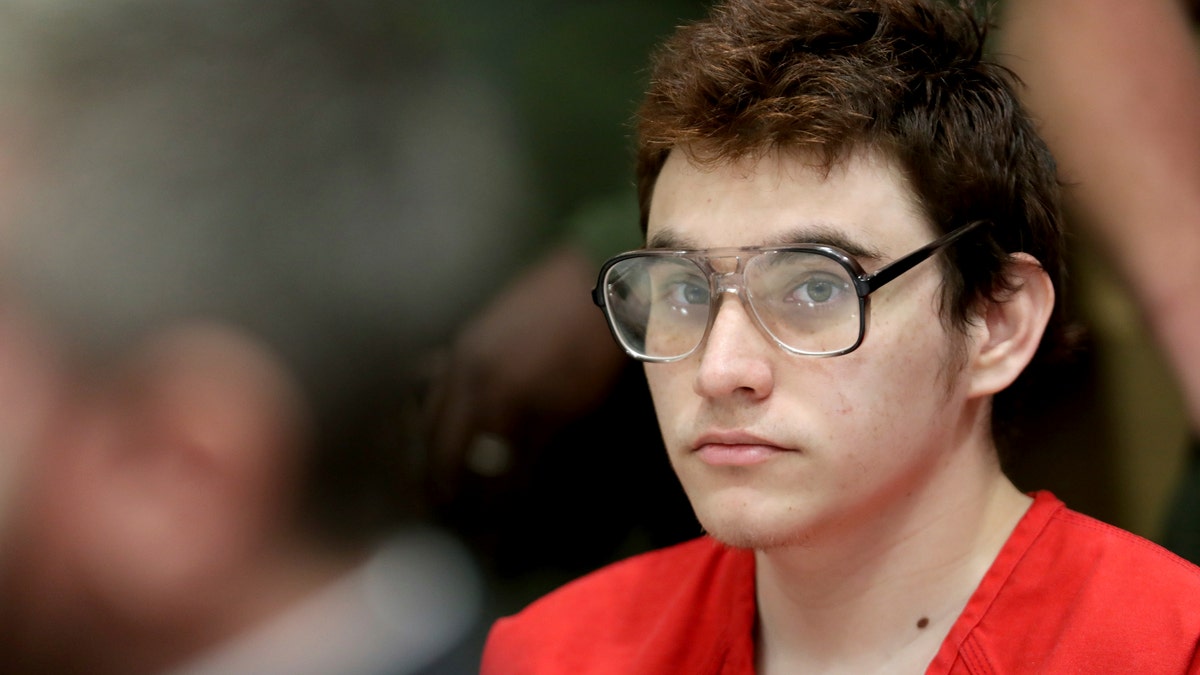 Parkland school suspect Nikolas Cruz listens during a hearing at the Broward Courthouse in Fort Lauderdale, Fla., Friday.