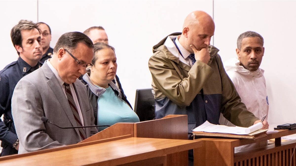 Michael Cammarata, far right, and his girlfriend Ayisha Egea, center, were arraigned together in Staten Island Criminal Court in St. George on Friday.