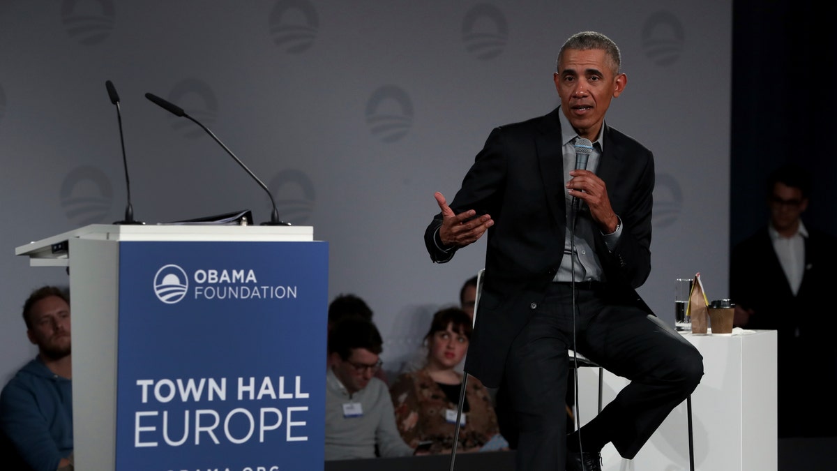 Former President Barack Obama gestures as he speaks during a town hall meeting at the European School For Management And Technology (ESMT) in Berlin, Germany, Saturday, April 6, 2019. (AP Photo/Michael Sohn)