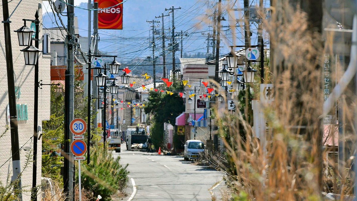 This April 9, 2019, photo shows central area of Okuma town, Fukushima. Japan has partially lifted an evacuation order in one of the two hometowns of the tsunami-wrecked Fukushima nuclear plant for the first time since the 2011 disaster. The action taken Wednesday, April 10, 2019, allows people to return about 40 percent of Okuma. The area seen in this photo is still under evacuation order. (Kyodo News via AP)