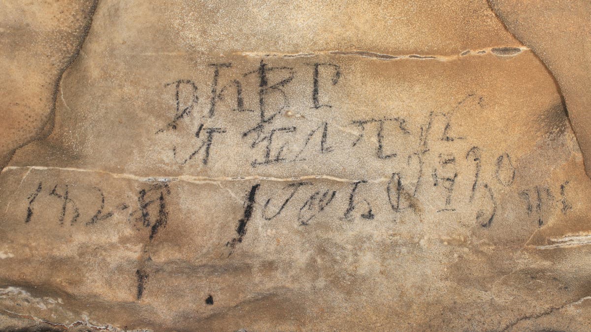 Cherokee syllabary inscription from almost a mile inside the Manitou Cave.