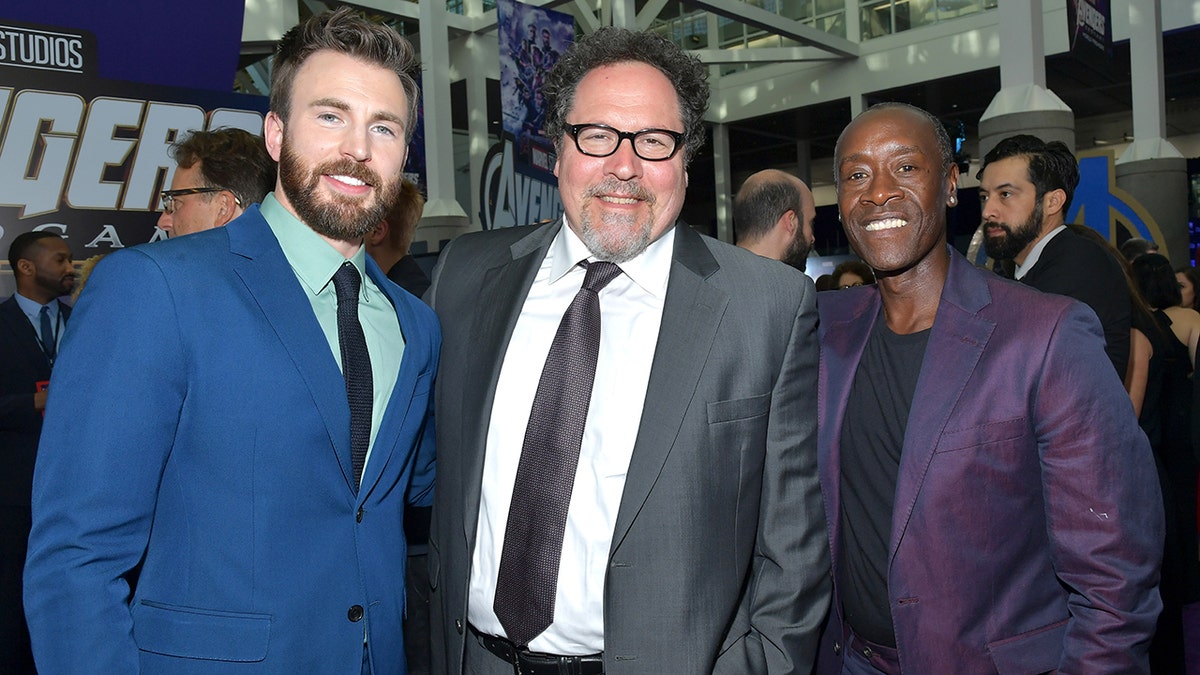 (L-R) Chris Evans, Jon Favreau and Don Cheadle attend the world premiere of "Avengers: Endgame" at the Los Angeles Convention Center on April 22, 2019 in Los Angeles, Calif.