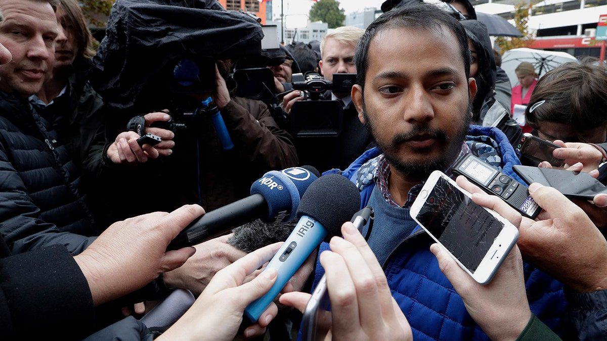 Tofazzal Alam, a survivor of the Linwood Mosque shootings, speaks to the media outside the High Court in Christchurch, New Zealand on Friday. (Associated Press)