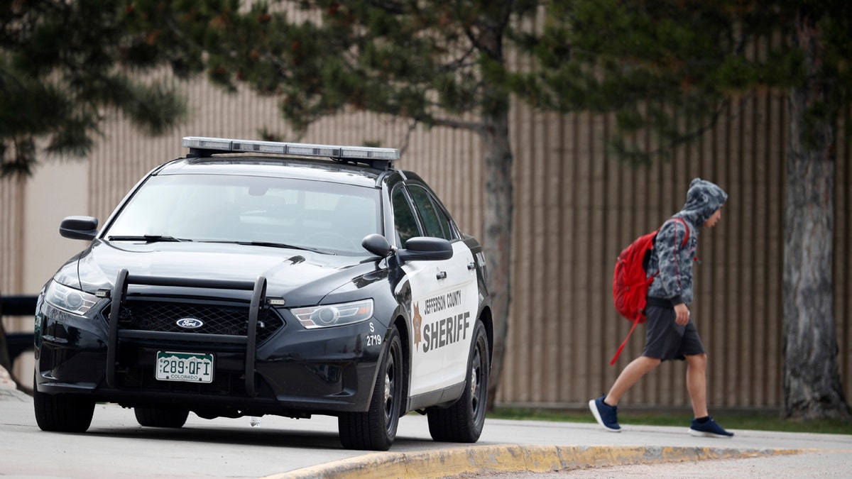 Following a lockdown at Columbine High School and other Denver area schools, authorities say they are looking for a woman suspected of making threats.