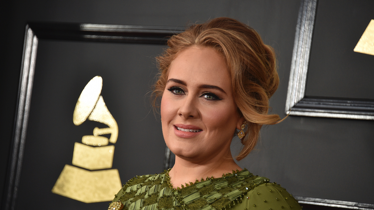 FILE - In this Feb. 12, 2017, file photo, Adele arrives at the 59th annual Grammy Awards at the Staples Center in Los Angeles. Adele and her husband Simon Konecki have separated. The pop singer’s representatives Benny Tarantini and Carl Fysh confirmed the news Friday, April 19, 2019 in a statement to The Associated Press. The statement read: “Adele and her partner have separated. They are committed to raising their son together lovingly. As always they ask for privacy. There will be no further comment.” (Photo by Jordan Strauss/Invision/AP, File)