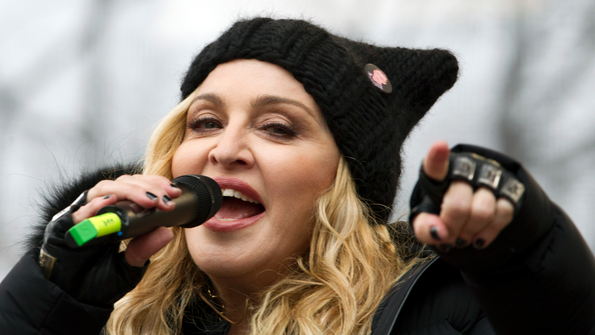 FILE - In this Jan. 21, 2017 file photo, Madonna performs on stage during the Women's March rally in Washington. Madonna and Colombian singer Maluma will bring their new collaboration to life when they perform at next month’s Billboard Music Awards. NBC and dick clark productions announced Friday, April 19, 2019 that the duo will sing 