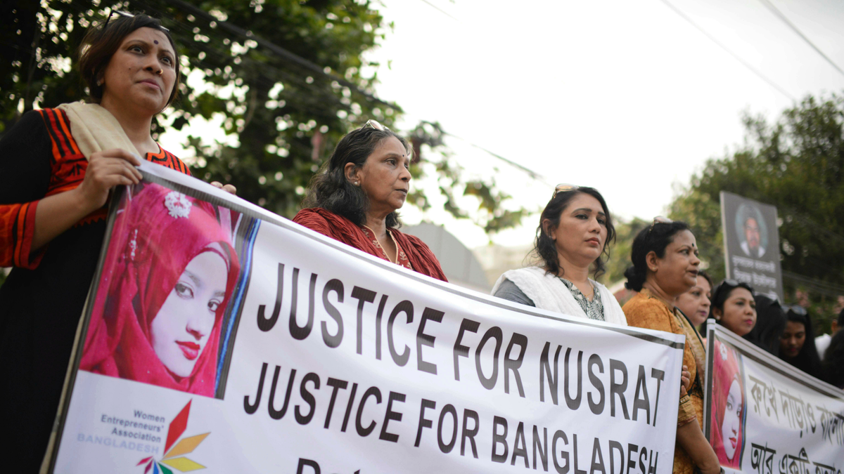 Protesters hold placards and gathered to demand justice for Nusrat Jahan Rafi who was allegedly killed after she was set on fire for refusing to drop sexual harassment charges against her Islamic school's principal, in Dhaka, Bangladesh, Friday, April 19, 2019. 