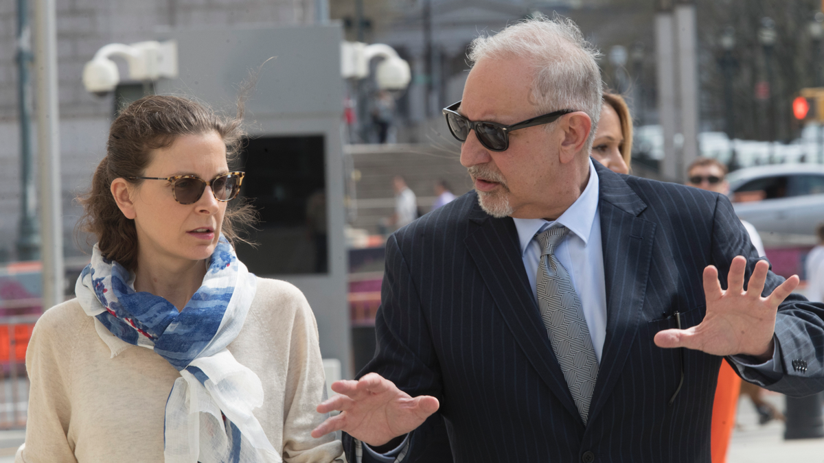 Clare Bronfman, left, arrives at Federal court with her attorney Mark Geragos in the Brooklyn borough of New York, Friday, April 19, 2019. Bronfman has pleaded guilty to charges implicating her in a sex-trafficking conspiracy case against an upstate New York self-help group. (AP Photo/Mary Altaffer)