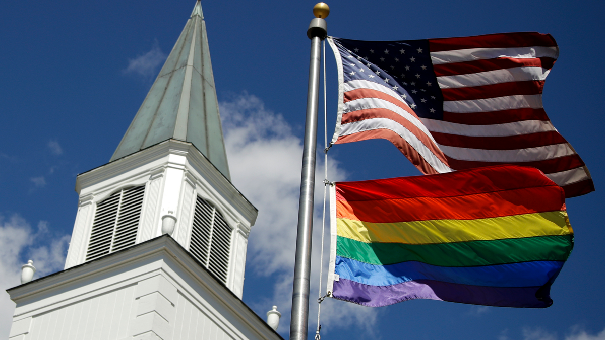 US, LGBT pride flags fly outside a Methodist church
