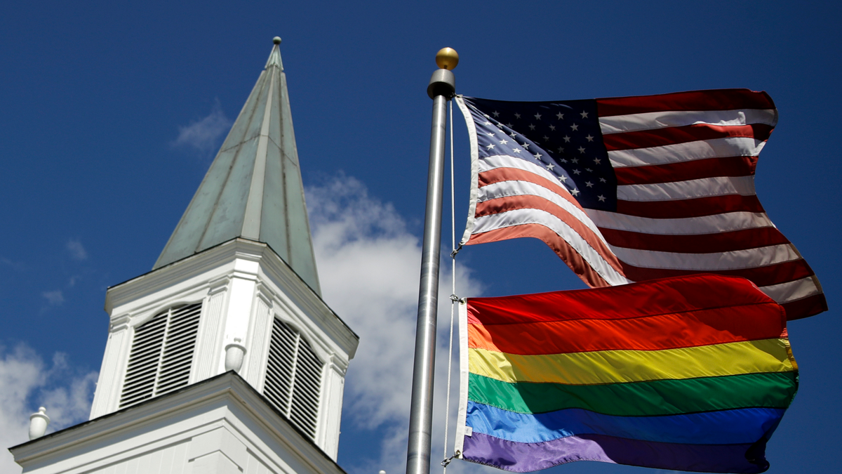 US, LGBT pride flags fly outside a Methodist church