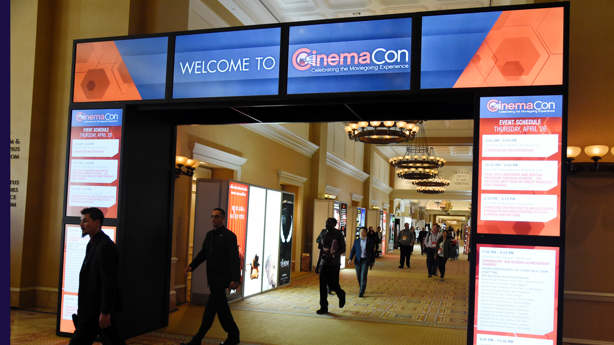 CinemaCon attendees walking through the lobby during CinemaCon 2018 in Las Vegas, the official convention of the National Association of Theatre Owners. 