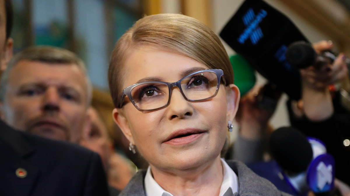 Former Ukrainian Prime Minister Yulia Tymoshenko, a candidate for the presidential elections, talks to the media after casting her ballot at a polling station during the presidential election in Kiev, Ukraine, Sunday, March 31, 2019. (AP Photo/Sergei Grits)