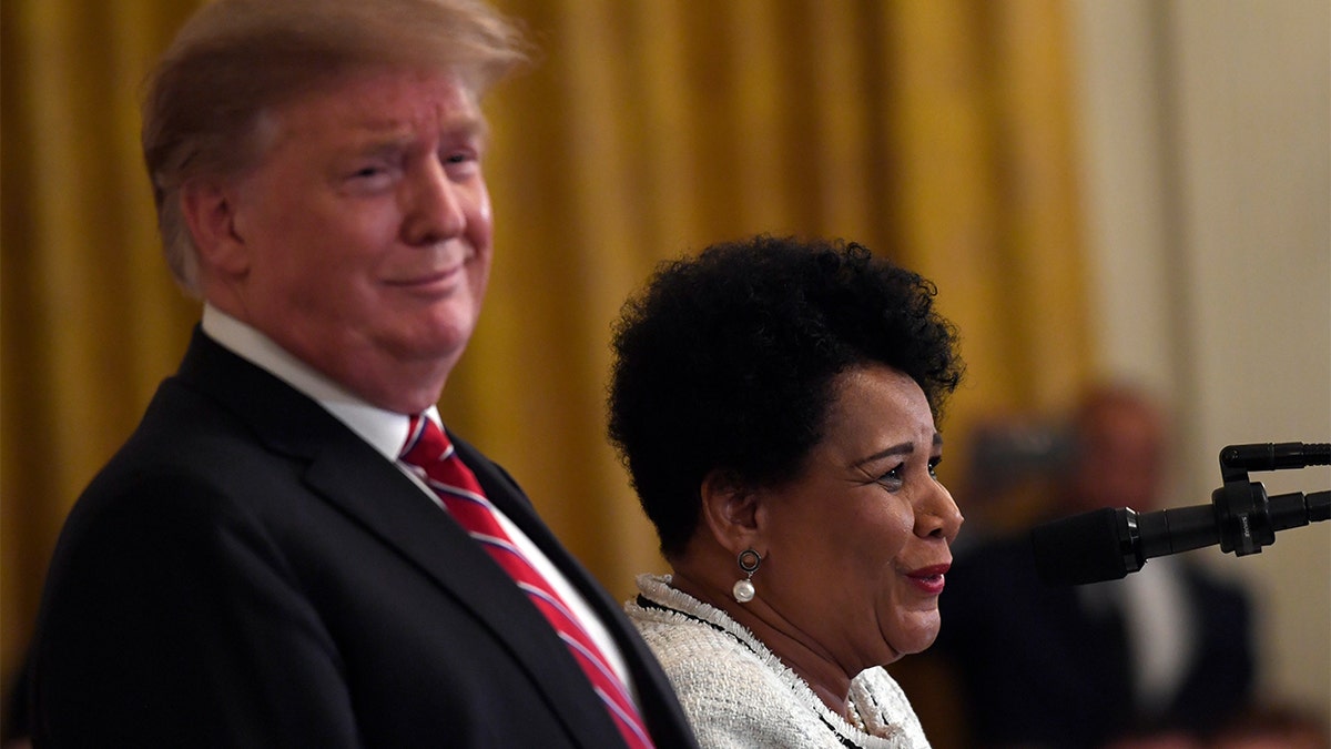 President Trump reacts as Johnson speaks at the 2019 Prison Reform Summit and First Step Act Celebration at the White House, April 1, 2019. (AP Photo/Susan Walsh)