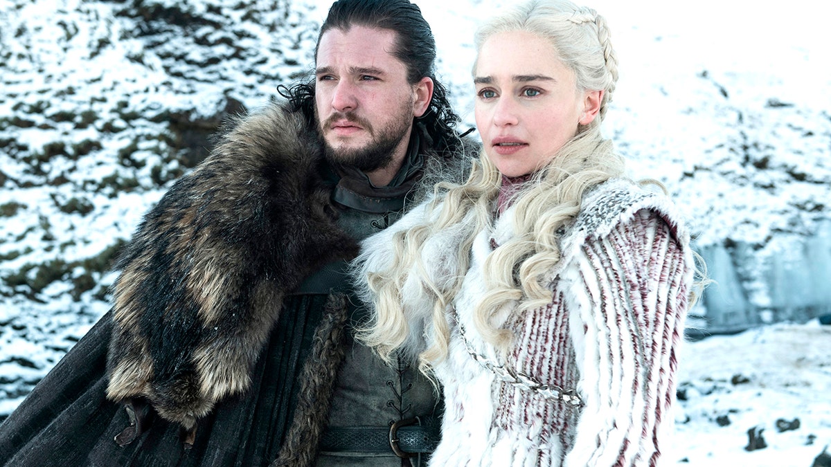 This photo released by HBO shows Kit Harington as Jon Snow, left, and Emilia Clarke as Daenerys Targaryen in a scene from 