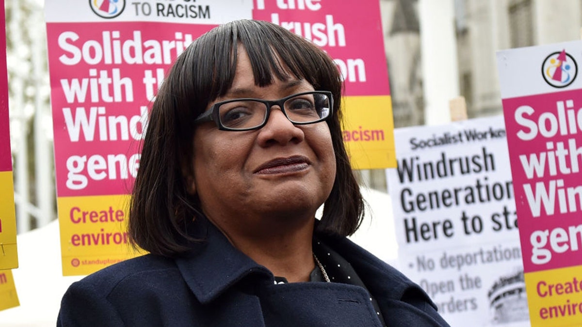 Shadow Home Secretary Diane Abbott has apologized after a photo circulated showing her drinking on the London Overground, where it is illegal to consume alcohol. 