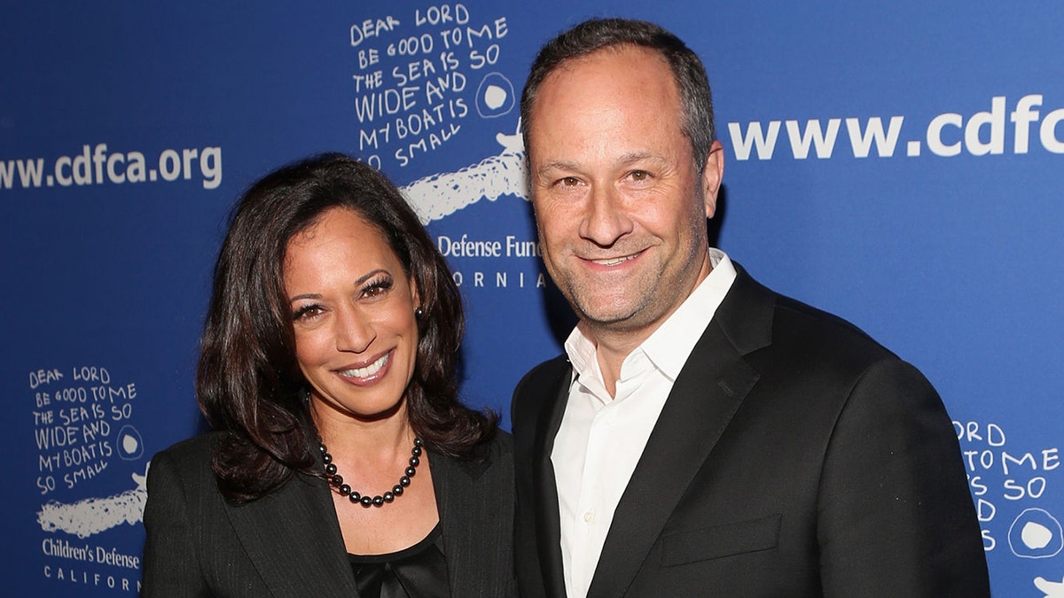 Then-California Attorney General Kamala Harris and lawyer Douglas Emhoff (R) attend Children's Defense Fund - California Hosts 24th Annual Beat The Odds Awards at Book Bindery on December 4, 2014 in Culver City, California. (Photo by Jesse Grant/Getty Images for Children's Defense Fund)